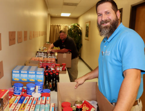 The Dewitt Tilton Group Assembles Holiday Food Packages for Richmond Hill Families in Need